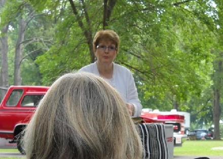 Pastor Judy Starting Sunday Morning Service in the Park